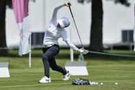 Wei-Ling Hsu, of Taiwan, stretches during a practice round prior to the women's golf event at the 2020 Summer Olympics, Monday, Aug. 2, 2021, at the Kasumigaseki Country Club in Kawagoe, Japan. (AP Photo/Andy Wong)