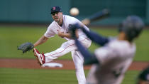 Boston Red Sox starter Rich Hill watches as a Seattle Mariners batter swings at a pitch during the first inning of a baseball game at Fenway Park, Thursday, May 19, 2022, in Boston. (AP Photo/Charles Krupa)