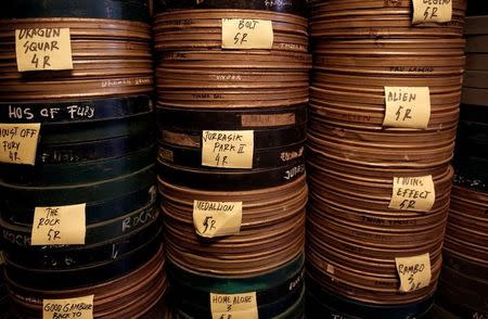 A pile of 35mm film cans is seen at Kamaludin's house in Tangerang, Indonesia, March 11, 2017. REUTERS/Beawiharta/Files