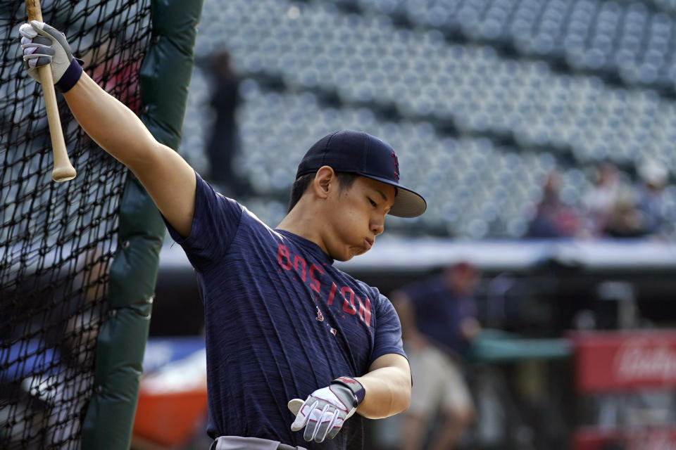 Boston Red Sox's Masataka Yoshida warms up before a baseball game against the Cleveland Guardians, Wednesday, June 7, 2023, in Cleveland. (AP Photo/Sue Ogrocki)