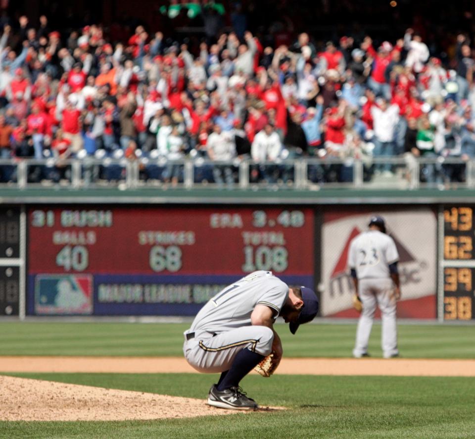 Brewers starting pitcher Dave Bush reacts after Philadelphia Phillies pinch-hitter Matt Stairs hit a solo home run breaking up his no-hitter in the eighth inning of a baseball game Thursday, April 23, 2009, in Philadelphia. The Brewers won 6-1.