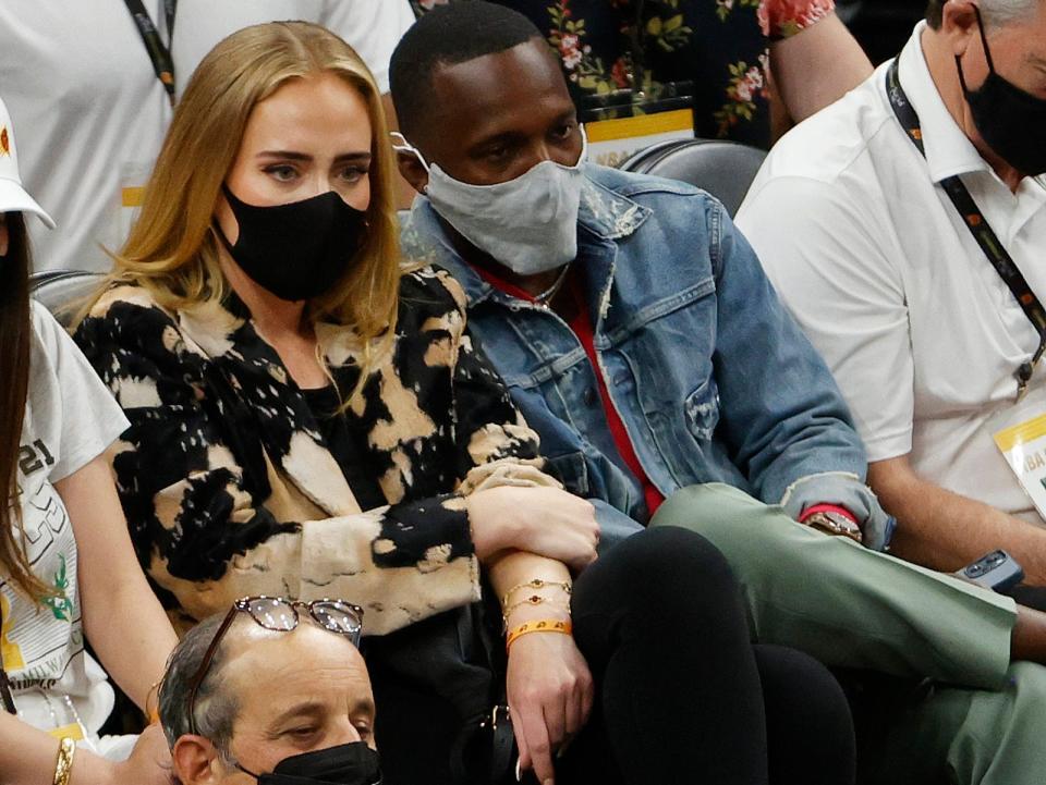 adele and rich paul sitting courtside at the 2021 NBA finals