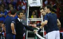 Tennis - Belgium v Great Britain - Davis Cup Final - Flanders Expo, Ghent, Belgium - 28/11/15 Men's Doubles - Great Britain captain Leon Smith, Andy Murray and Jamie Murray talk to the umpire during their match against Belgium's Steve Darcis and David Goffin Action Images via Reuters / Jason Cairnduff Livepic