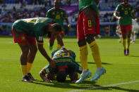 Cameroon's Jean-Charles Castelletto, center, celebrates with teammates after scoring the opening goal during the World Cup group G soccer match between Cameroon and Serbia, at the Al Janoub Stadium in Al Wakrah, Qatar, Monday, Nov. 28, 2022. (AP Photo/Alessandra Tarantino)