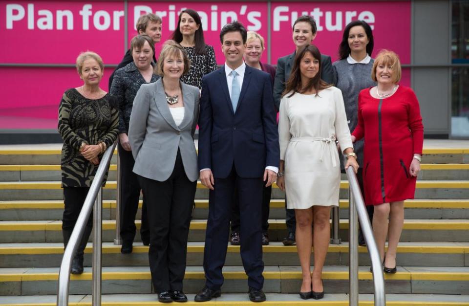 Ed Miliband poses with female members of the shadow cabinet in 2014, including Cooper (third from left)