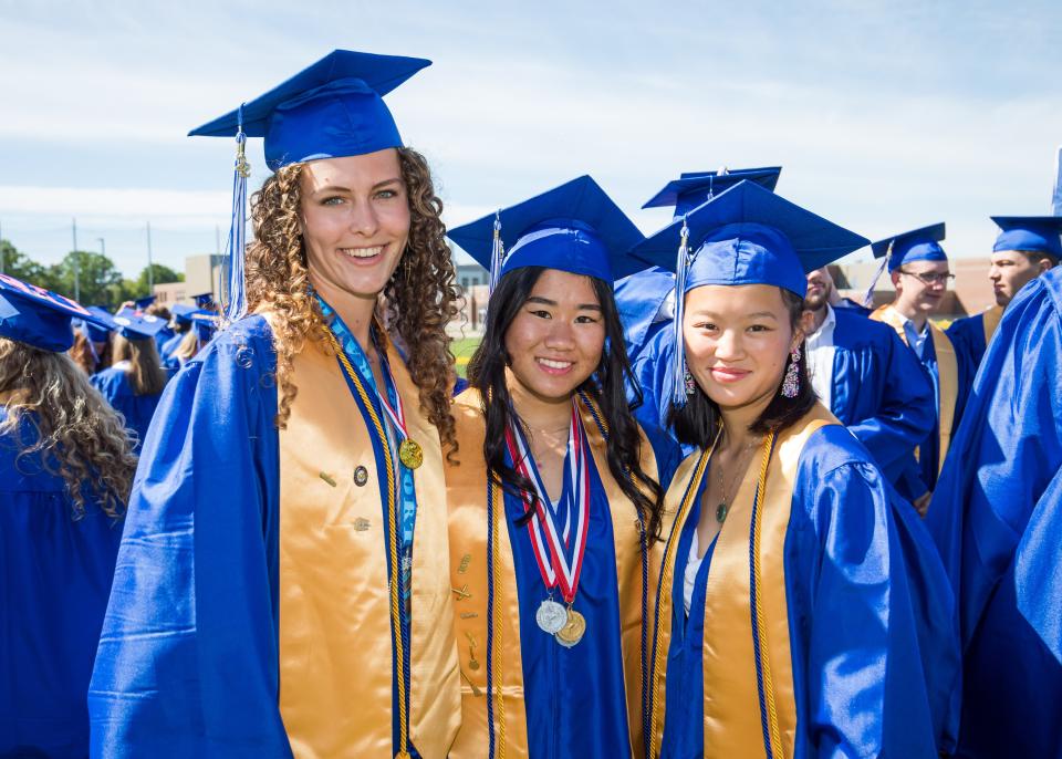 Seniors Ella Boxall, Samantha McGrath and Mae Richardson pose for a photo before their graduation. Kennebunk High School hels its 147th Commencement on Sunday, June 5 at the school.