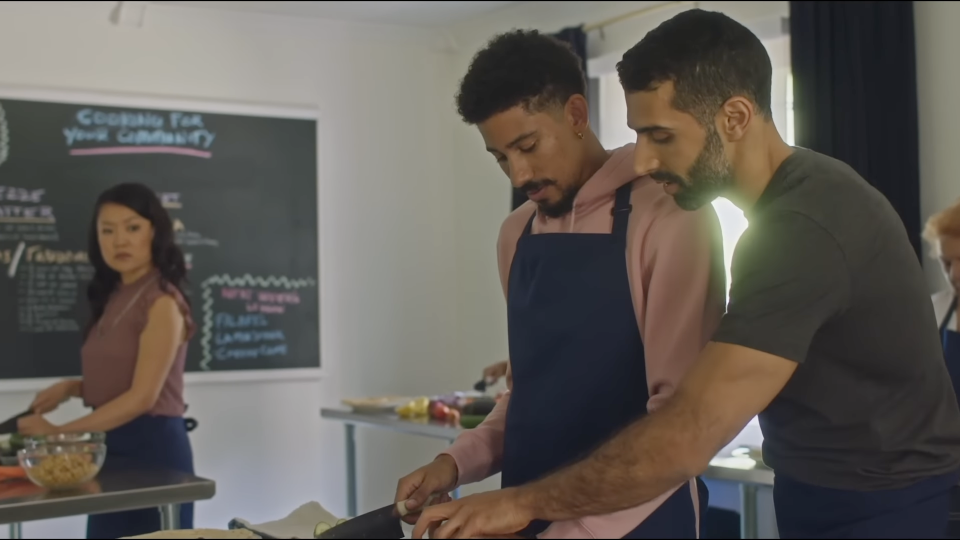 Rafi teaches Andrew how to chop a cucumber in "My Fake Boyfriend." 