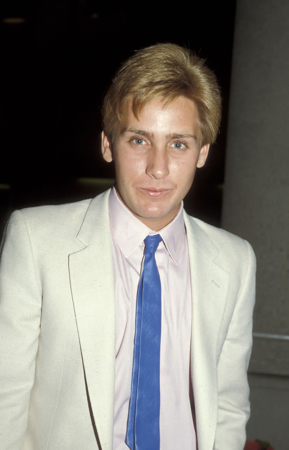 <p>Emilio Estevez is best known as being an original member of the <a href="https://www.imdb.com/name/nm0000389/" rel="nofollow noopener" target="_blank" data-ylk="slk:"Brat Pack,";elm:context_link;itc:0;sec:content-canvas" class="link ">"Brat Pack,"</a> after appearing in some of the most iconic movies from the '80s, including <em>The Breakfast Club </em>(1985), <em>St. Elmo's Fire </em>(1985), and <em>The Outsiders </em>(1983)<em>.</em></p>