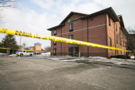 Crime scene investigative equipment is set up in parking lot of the Extended Stay America Hotel on Friday, March 8, 2019, in Rockford, Ill., after the fatal shooting of McHenry County Sheriff's Deputy Jacob Keltner at the hotel on Thursday. Floyd E. Brown is scheduled to appear in court Monday in Rockford, where prosecutors say he shot and killed the deputy working with a U.S. Marshal's Service fugitive task force serving Brown an arrest warrant. (Scott P. Yates/Rockford Register Star via AP)
