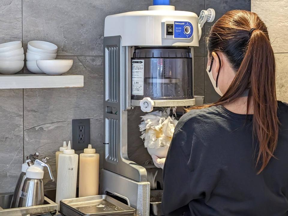 Pastry chef Miho Horio preparing a Japanese shaved ice dessert at her restaurant  in Tokyo.