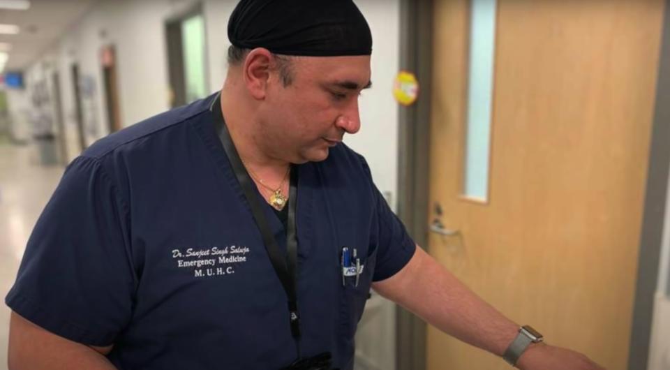 Dr. Sanjeet Singh Saluja made the personal decision to shave his beard in order to work with COVID-19 patients. (Screencap/Impact de Montreal/YouTube)