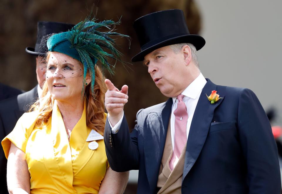 Sarah Ferguson is seen in a yellow dress with v-shaped neck and a green feathered hat