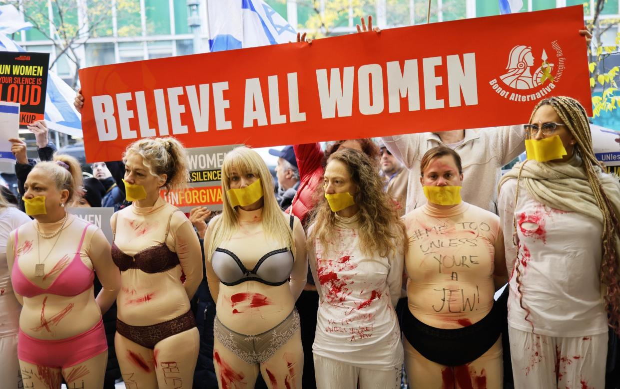 Protestors gather at the offices of the United Nations Women