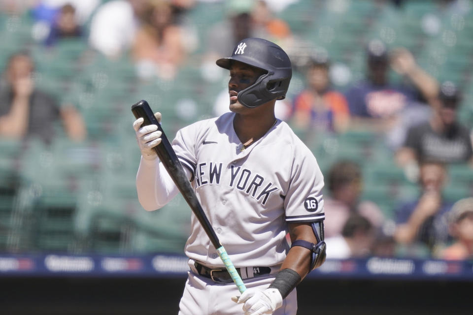 New York Yankees' Miguel Andujar walks to the dugout after striking out during the fourth inning of a baseball game against the Detroit Tigers, Sunday, May 30, 2021, in Detroit. (AP Photo/Carlos Osorio)