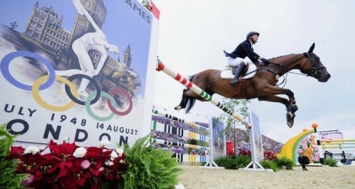 Germany's Michael Jung competes in the London Olympics eventing individual jumping event at the equestrian venue in Greenwich Park on July 31. Defending champions Germany won the equestrian three-day eventing