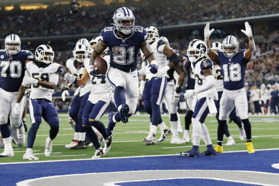 Dallas Cowboys running back Ezekiel Elliott (21) jumps into the end zone with a touchdown against the Los Angeles Rams. (AP Photo/Roger Steinman)