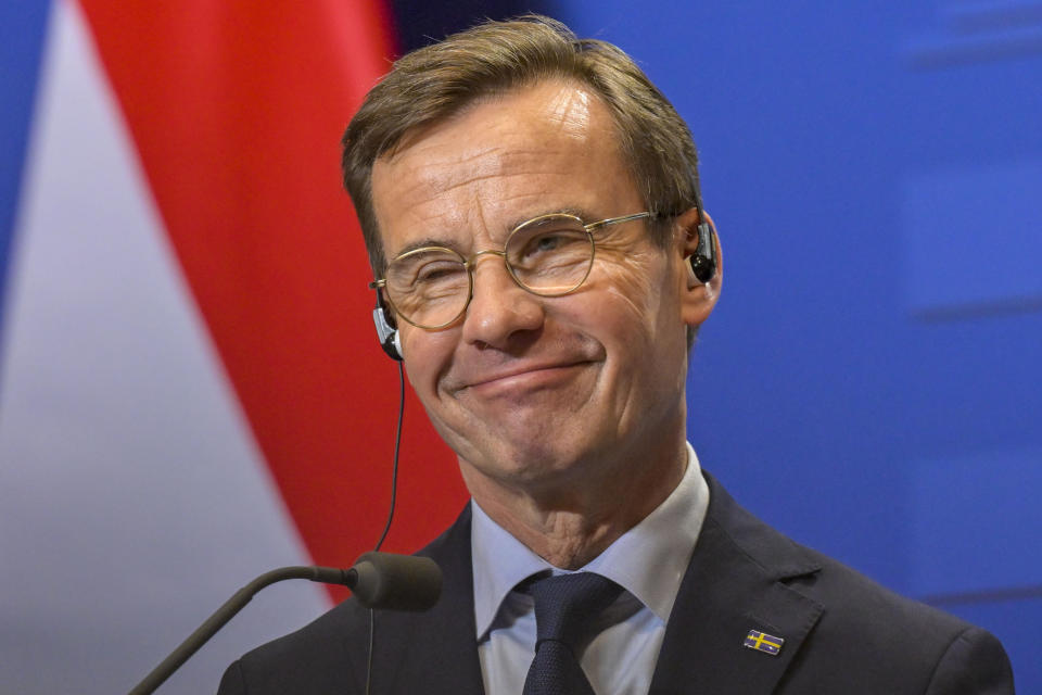 Sweden's Prime Minister Ulf Kristersson smiles during a press conference with his Hungarian counterpart Viktor Orban at the Carmelite Monastery in Budapest, Hungary, Friday, Feb 23, 2024. Nearly two years after Sweden formally applied to join NATO, its membership now hinges on convincing one country - Viktor Orban's Hungary - to formally ratify its bid to join the military alliance. (AP Photo/Denes Erdos)