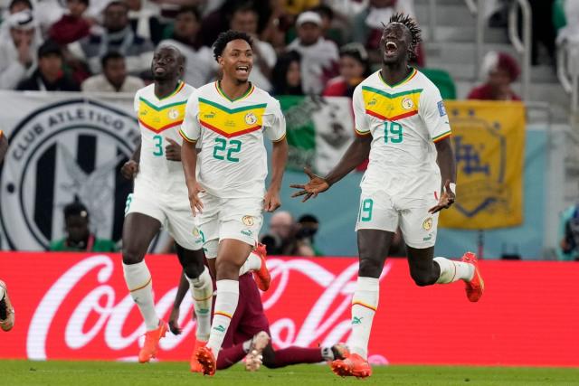 Soccer-Hosts Qatar crash out of World Cup after Senegal loss