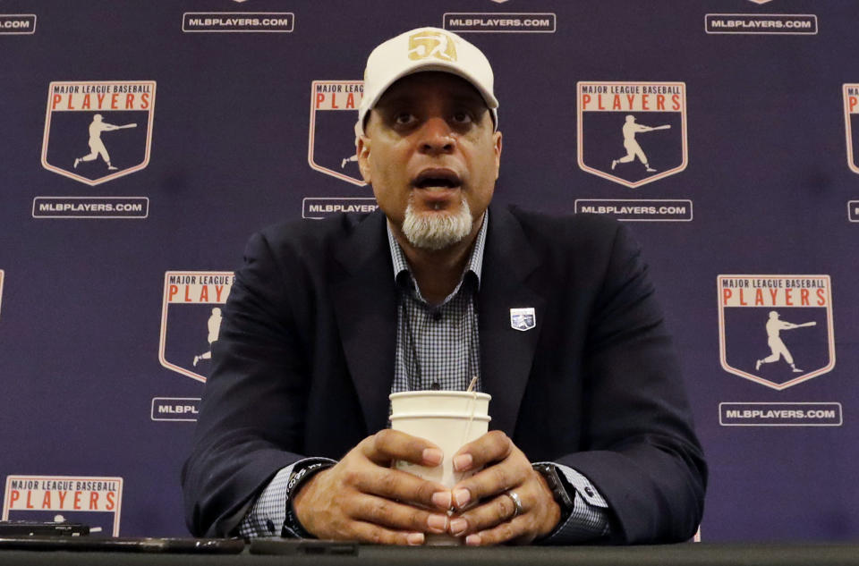 Tony Clark, executive director of the Major League Players Association, answers questions at a news conference in Phoenix. Baseball commissioner Rob Manfred is defending teams’ reluctance to sign free agents last offseason and says union head Tony Clark has not responded to a pair of invitations to have a broad discussion about players’ concerns and changes in the way the game is played. (AP Photo)