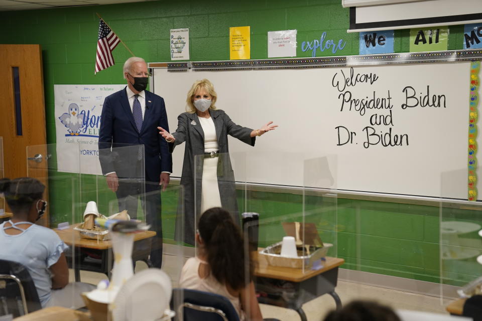 President Joe Biden and first lady Jill Biden talk to students during a visit to Yorktown Elementary School, Monday, May 3, 2021, in Yorktown, Va. (AP Photo/Evan Vucci)