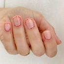 <p>Nail artist Betina Goldstein glued red stitching around a sheer nude manicure, resulting in one of the coolest nail art looks we've seen this year.</p><p><a href="https://www.instagram.com/p/Btdnc1vABwI/" rel="nofollow noopener" target="_blank" data-ylk="slk:See the original post on Instagram;elm:context_link;itc:0;sec:content-canvas" class="link ">See the original post on Instagram</a></p>