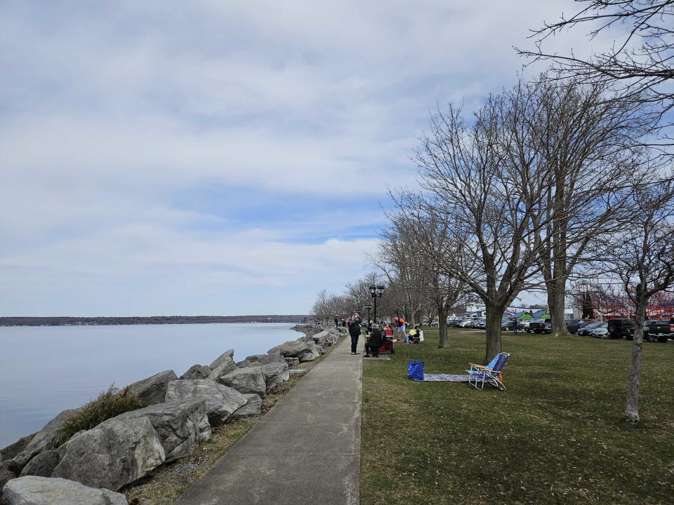 People in Sylvan Beach, N.Y. get ready to watch the eclipse.