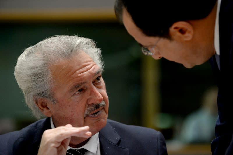 FILE PHOTO: Luxembourg Foreign Minister Jean Asselborn talks to Cypriot Foreign Minister Nikos Christodoulides during a European Union Foreign Ministers council in Brussels