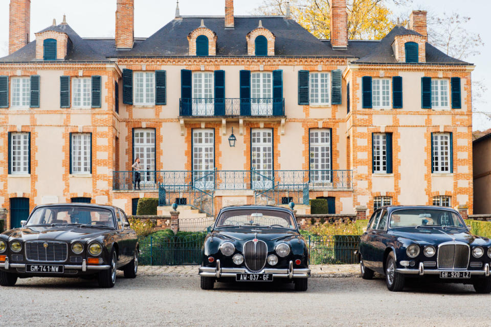 Classic cars in front of Maison Taittinger<p>Courtesy of Taittinger</p>