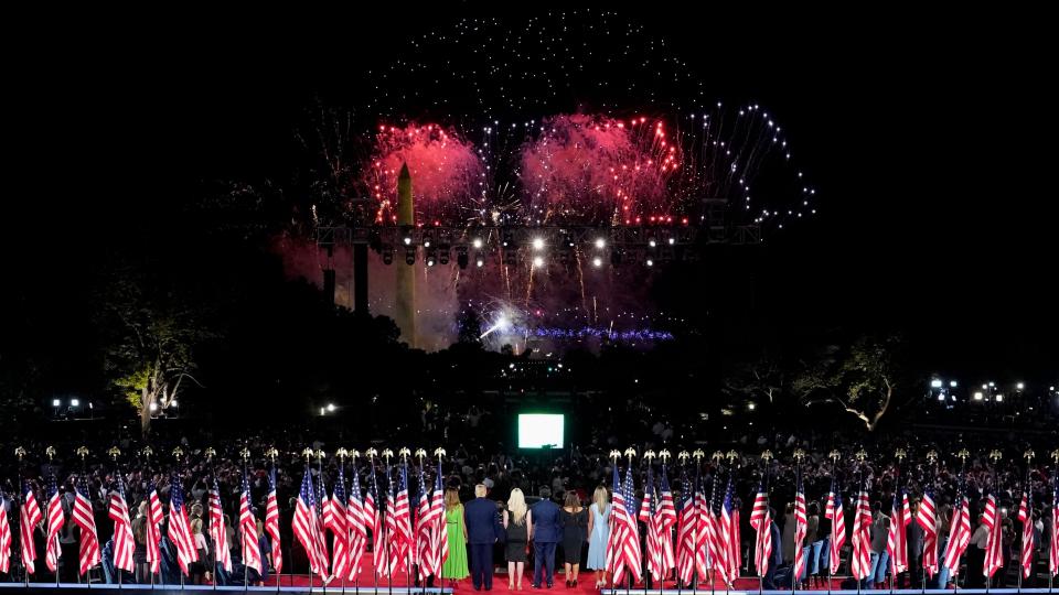 President Donald Trump, first lady Melania Trump and family members stand to watch fireworks after the president delivered his acceptance speech at the Republican National Convention on Thursday night.  (Photo: DOUG MILLS via Getty Images)