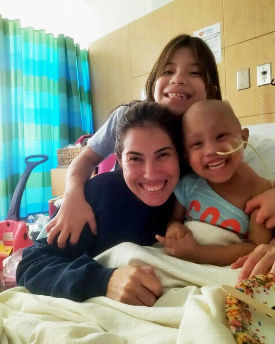 Mercedes Lobo, lower left, and Paulina, top, at the hospital giving Salma support.