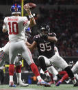 Atlanta Falcons defensive end Jack Crawford (95) pressures New York Giants quarterback Eli Manning (10) during the first half of an NFL football game, Monday, Oct. 22, 2018, in Atlanta. (AP Photo/John Amis)