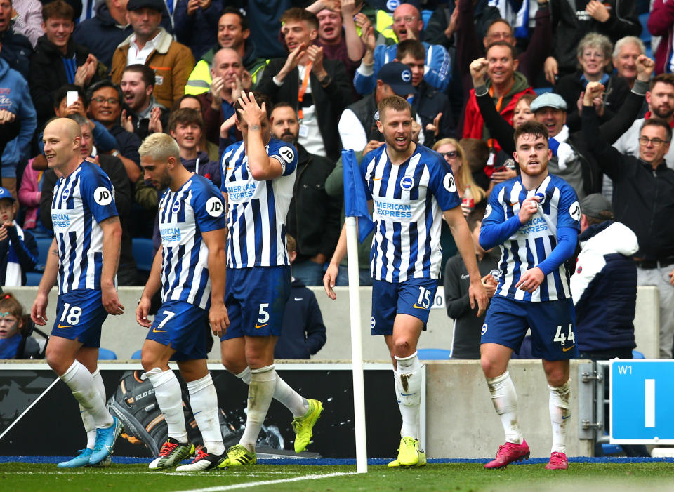 Aaron Connolly of Brighton and Hove Albion celebrates with teammates. (Photo by Charlie Crowhurst/Getty Images)