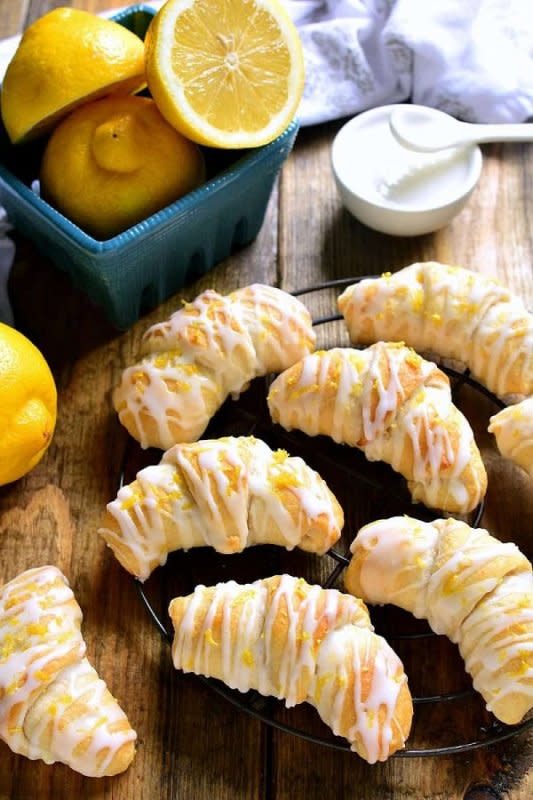 <p>Lemon Tree Dwelling</p><p>Lemon Cheesecake Crescent Rolls are bursting with delicious lemon flavor! These flaky crescent rolls are filled with creamy lemon cheesecake and topped with a sweet citrus glaze. The perfect brunch recipe!</p><p><strong>Get the recipe: <a href="https://www.lemontreedwelling.com/lemon-cheesecake-crescent-rolls/" rel="nofollow noopener" target="_blank" data-ylk="slk:Lemon Cheesecake Crescent Rolls;elm:context_link;itc:0;sec:content-canvas" class="link ">Lemon Cheesecake Crescent Rolls</a></strong></p>