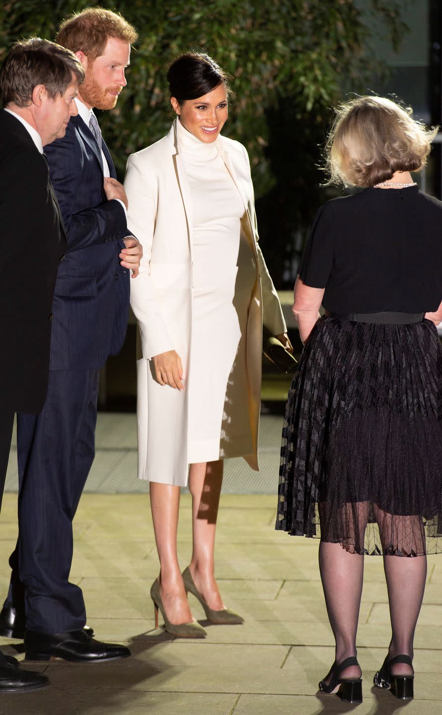 The royals meet representatives as they enter the museum.