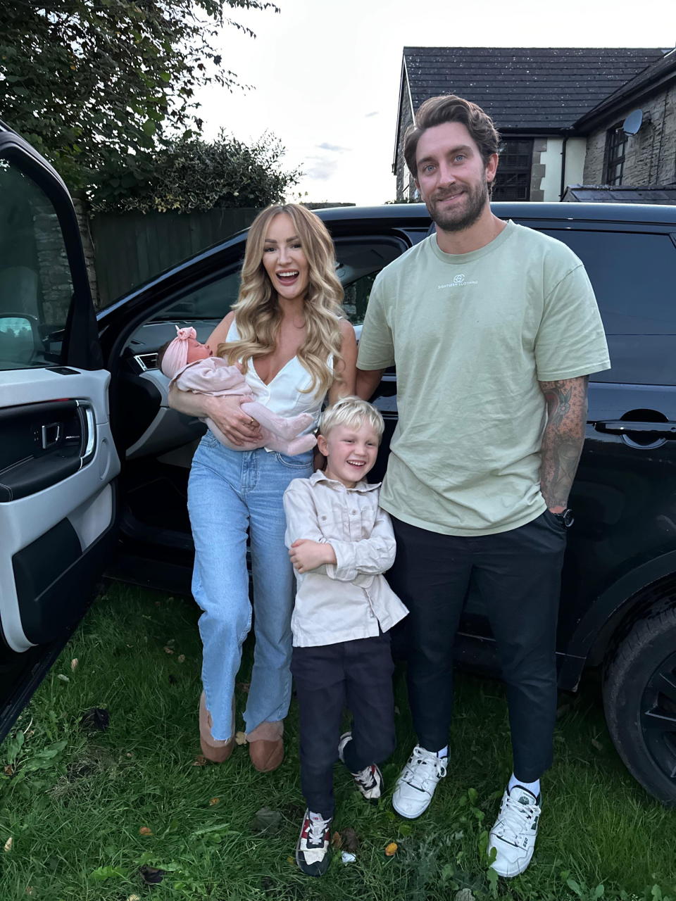 Emily and Jake pictured with baby Piper and her big brother, Roman. (SWNS/Emily Elizabeth)