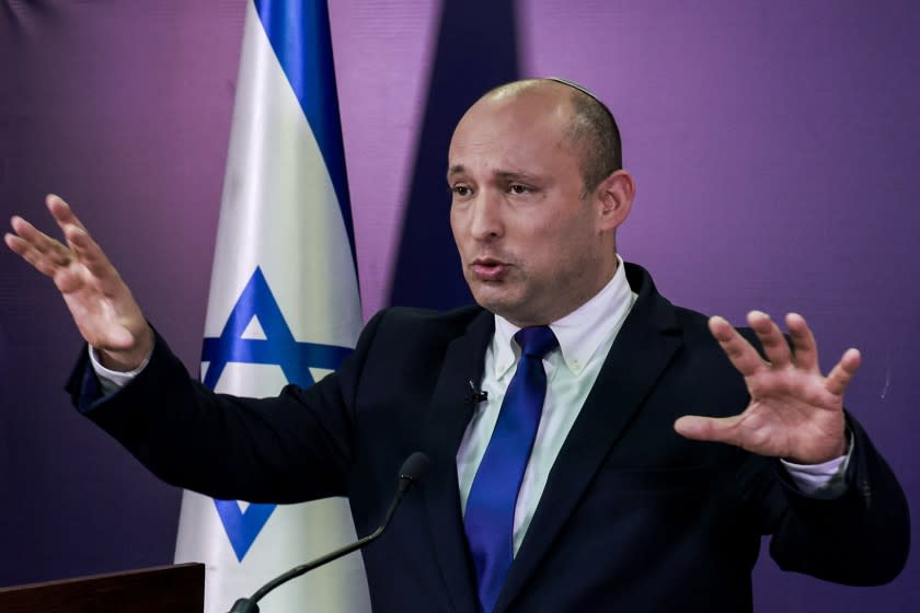 Naftali Bennett, Israeli parliament member from the Yamina party, gives a statement at the Knesset, Israel's parliament, in Jerusalem, Sunday, June 6, 2021. (Menahem Kahana/Pool via AP)