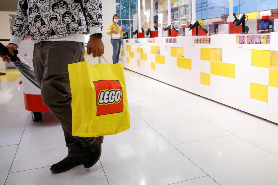 Customer shops in the 5th Avenue Lego store in New York