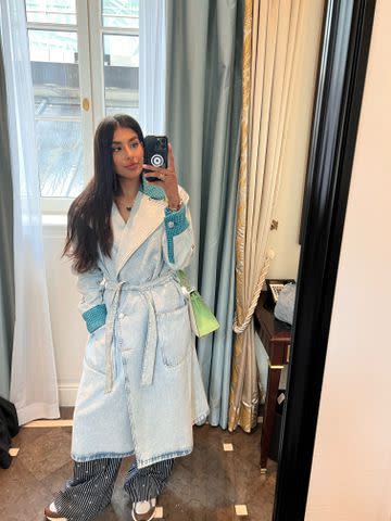 <p>Courtesy of Seema Bansal Chadha</p> Bansal Chadha in a Chanel denim trench.