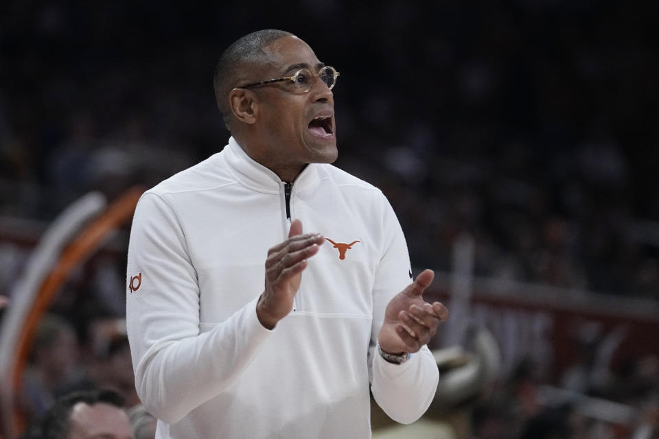 Texas coach Rodney Terry talks to players during the first half of an NCAA college basketball game against UNC Greensboro in Austin, Texas, Friday, Dec. 29, 2023. (AP Photo/Eric Gay)