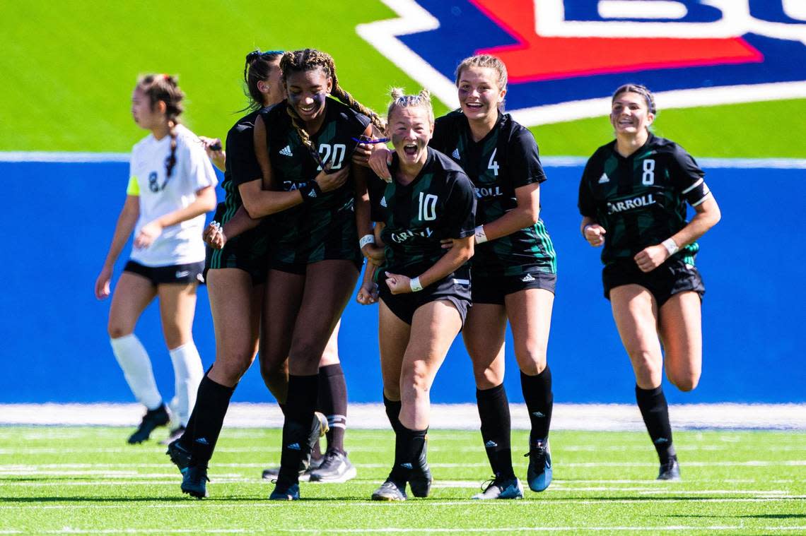 Kennedy Fuller (10) of Carroll celebrates with her teammates after scoring a goal late in the 1st half of the 6A Regional Final match against the Marcus Marauders at McKinney ISD Stadium on April 9th, 2022. (Matt Smith/Star Telegram)