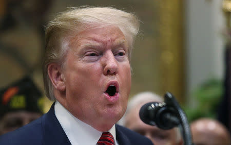 FILE PHOTO: U.S. President Donald Trump speaks during a ceremony to sign an executive order on veterans suicide prevention in the Roosevelt Room at the White House in Washington, U.S., March 5, 2019. REUTERS/Jonathan Ernst