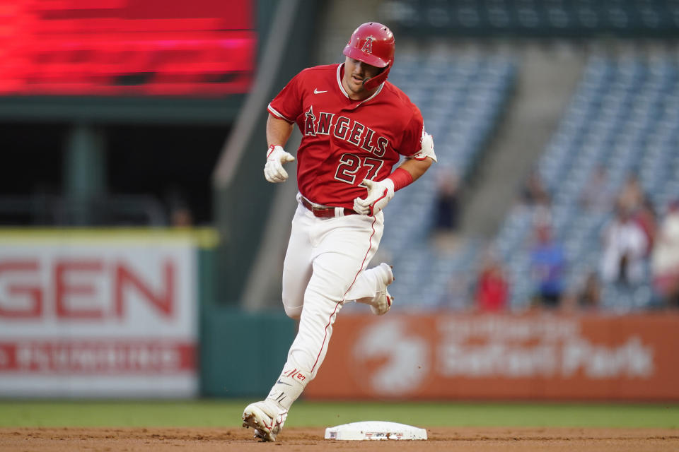 Los Angeles Angels' Mike Trout (27) runs the bases after hitting a home run during the first inning of a baseball game against the Detroit Tigers in Anaheim, Calif., Tuesday, Sept. 6, 2022. (AP Photo/Ashley Landis)
