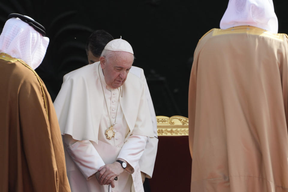 Pope Francis leaves the closing session of the "Bahrain Forum for Dialogue: East and west for Human Coexistence", at the Al-Fida square at the Sakhir Royal palace, Bahrain, Friday, Nov. 4, 2022. Pope Francis is making the November 3-6 visit to participate in a government-sponsored conference on East-West dialogue and to minister to Bahrain's tiny Catholic community, part of his effort to pursue dialogue with the Muslim world. (AP Photo/Hussein Malla)