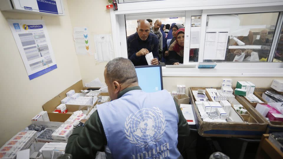 Palestinian patients gather at an UNRWA health center to receive medicine in Deir al Balah, Gaza, on January 21. - Ashraf Amra/Anadolu/Getty Images