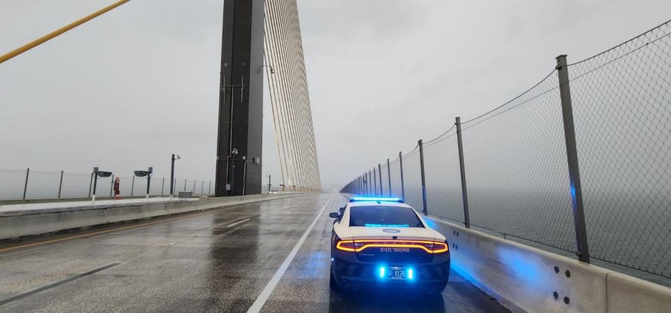 A state trooper sits on the Sunshine Skyway Bridge, which was closed Thursday (FHP Tampa)