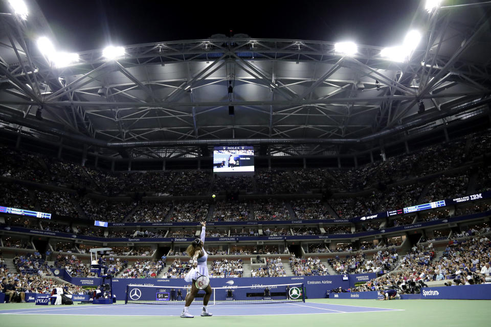 Serena Williams, of the United States, serves to Carina Witthoeft, of Germany, during the second round of the U.S. Open tennis tournament Wednesday, Aug. 29, 2018, in New York. (AP Photo/Julio Cortez)