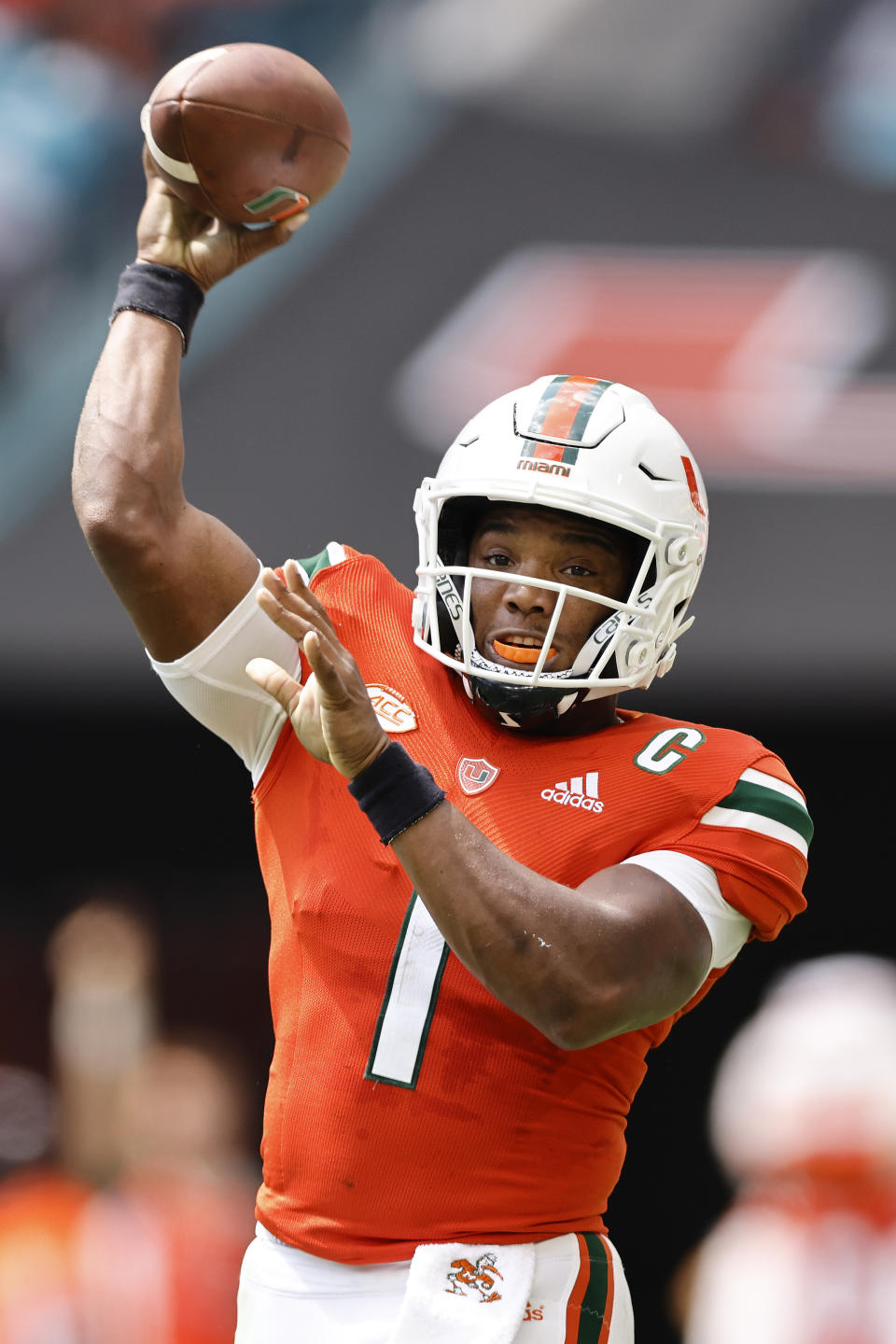 Miami quarterback D'Eriq King (1) throws a pass during the first quarter of an NCAA college football game against Michigan State, Saturday, Sept. 18, 2021, in Miami Gardens, Fla. (AP Photo/Michael Reaves)