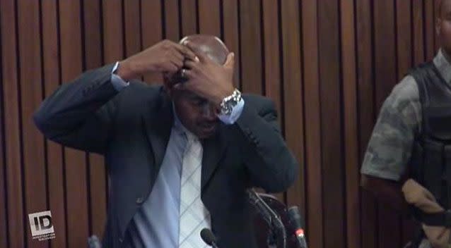 Mr Mangena illustrating where the bullet hit Ms Steenkamp during the trial. Source: Discovery Channel