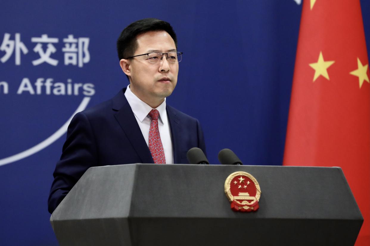 BEIJING, CHINA - DECEMBER 20: Chinese Foreign Ministry spokesman Zhao Lijian attends a news conference on December 20, 2021 in Beijing, China. (Photo by VCG/VCG via Getty Images)