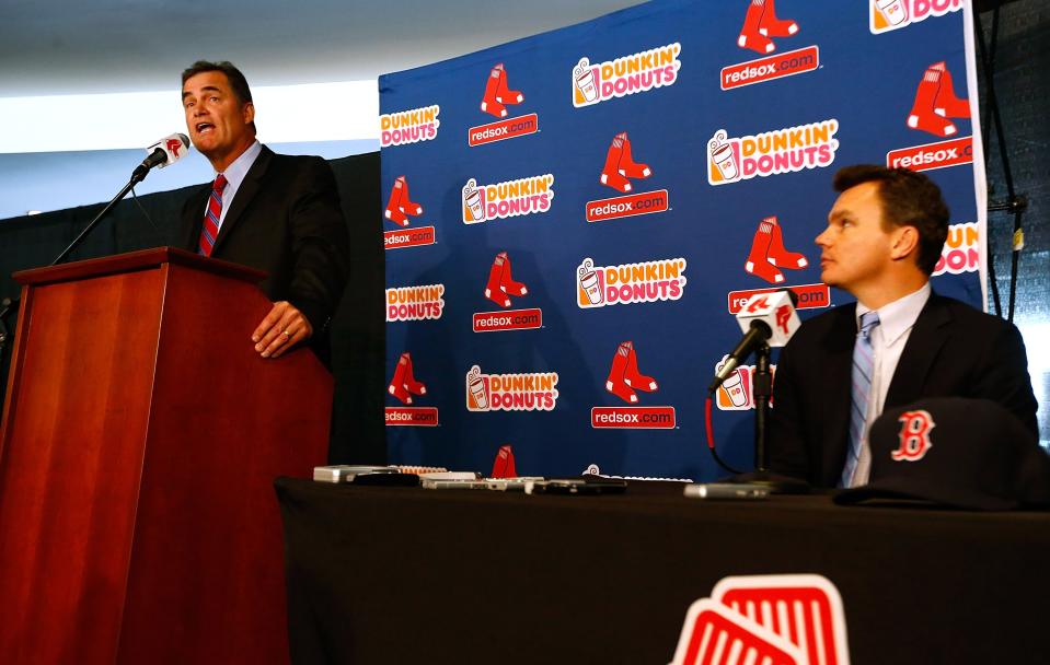 BOSTON, MA - OCTOBER 23: Executive Vice President and General Manager of the Boston Red Sox, Ben Cherington (R), introduces John Farrell as the new manager, the 46th manager in the club's 112-year history, on October 23, 2012 at Fenway Park in Boston, Massachusetts. (Photo by Jared Wickerham/Getty Images)